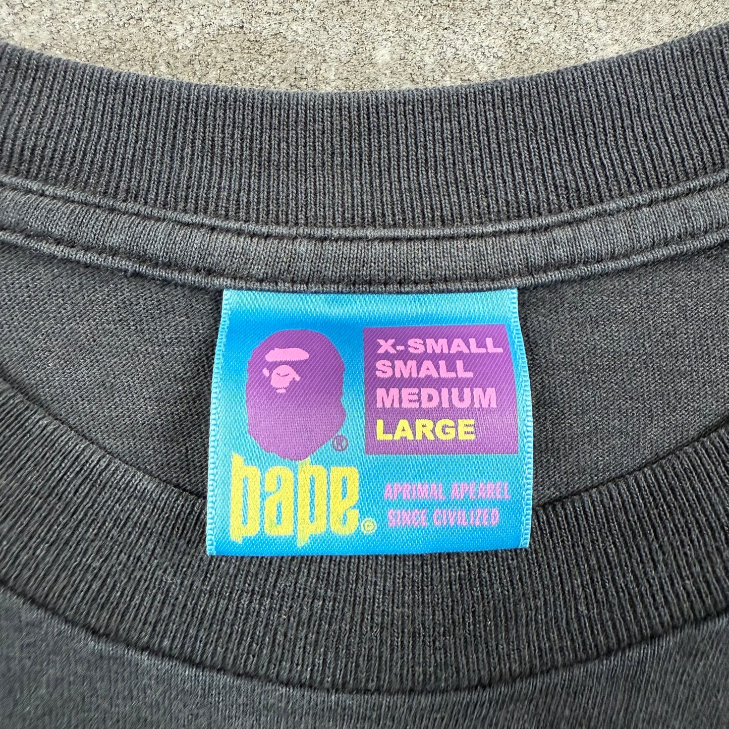 A BATHING APE × KAWS 10s BIG HEAD Tee L